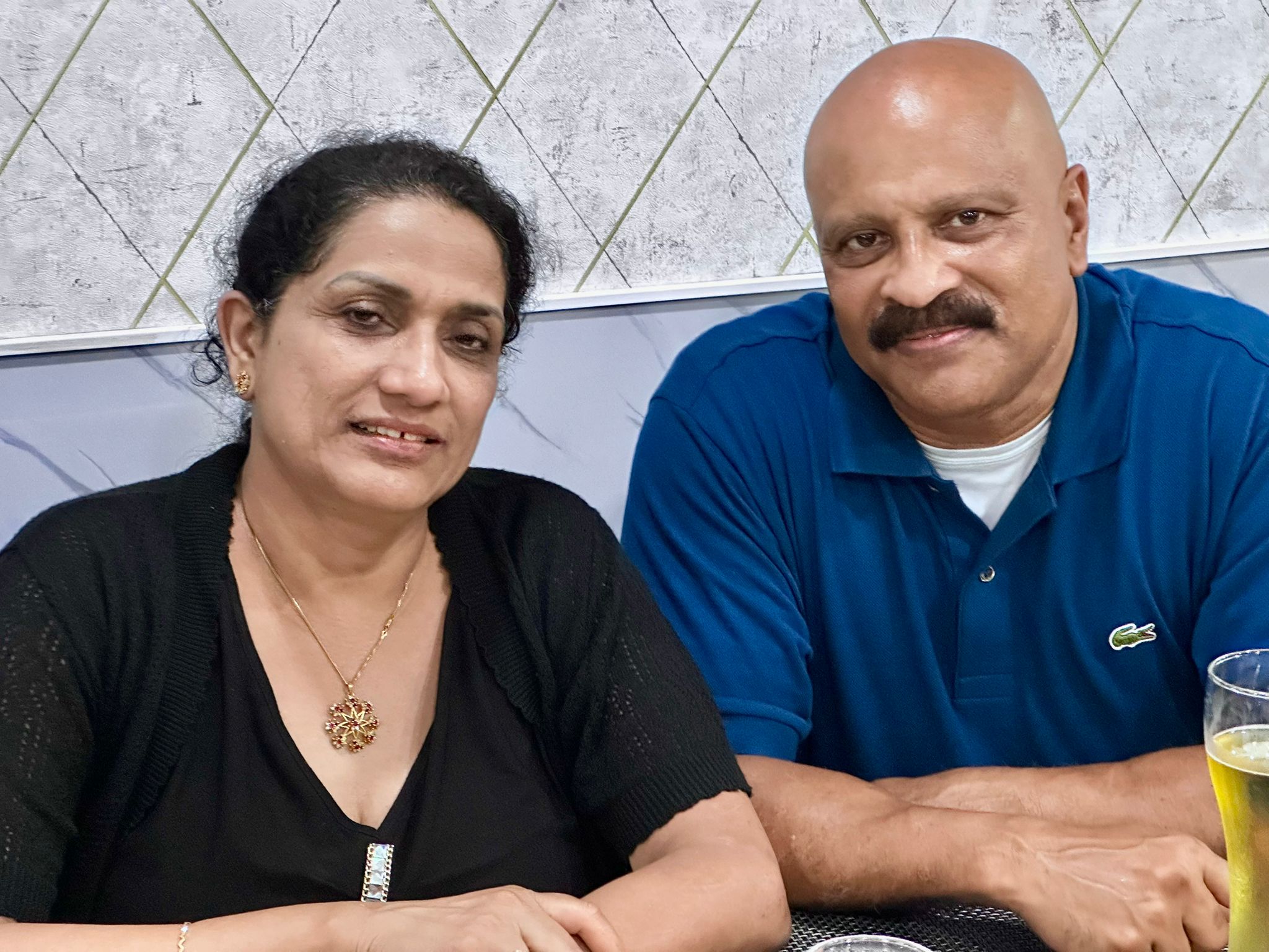 Couple Posing Inside Dining Room
