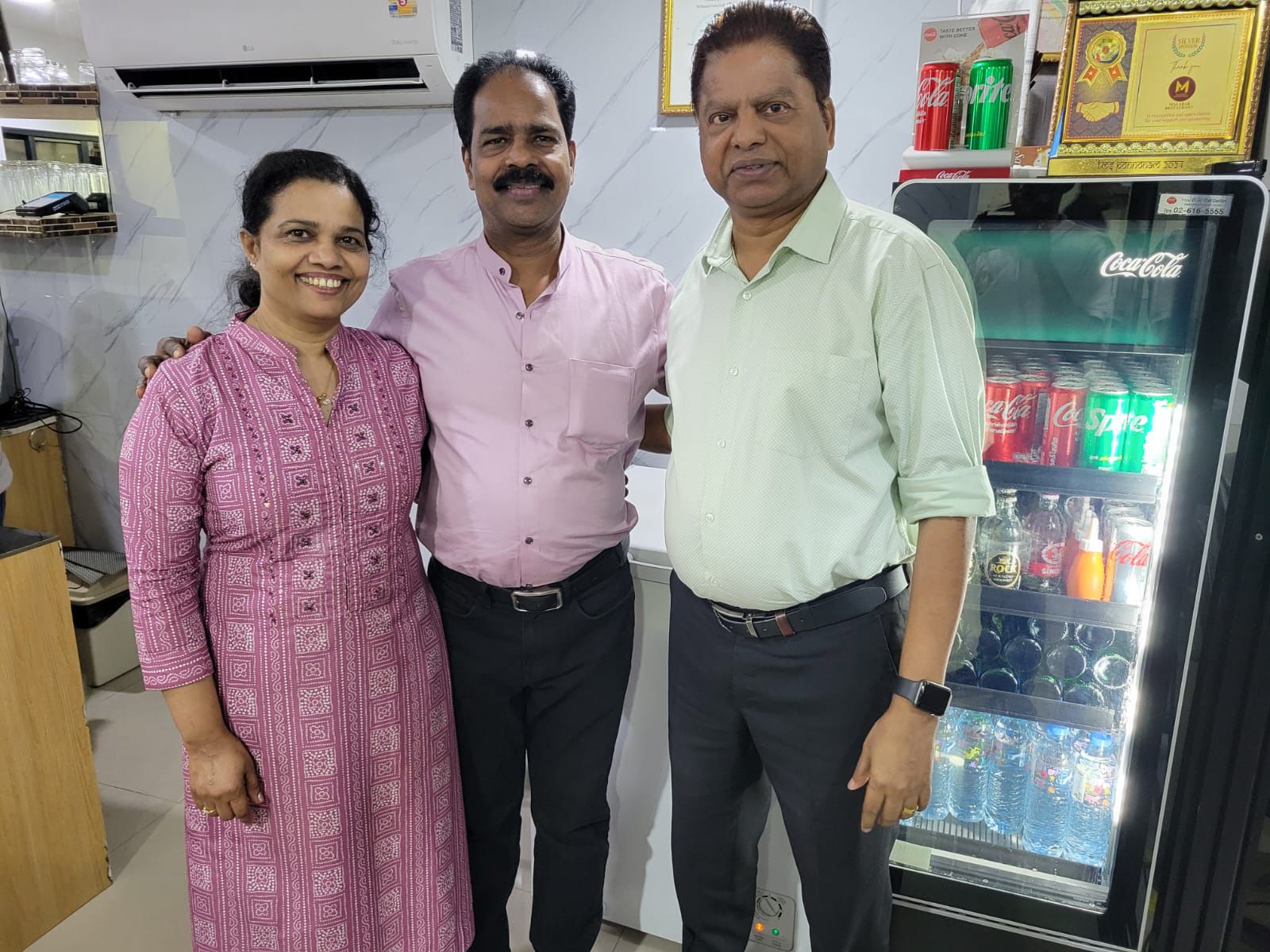 Three Guests Posing Inside